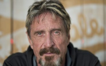 John McAfee Antivirus pioneer John McAfee poses for a photograph in Montreal, Friday, August 24, 2013.(AP Photo/The Canadian Press, Graham Hughes)