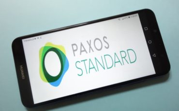 KONSKIE-POLAND-November-17-2018-Paxos-Standard-PAX-cryptocurrency-logo-displayed-on-smartphone KONSKIE-POLAND-November-17-2018-Paxos-Standard-PAX-cryptocurrency-logo-displayed-on-smartphone