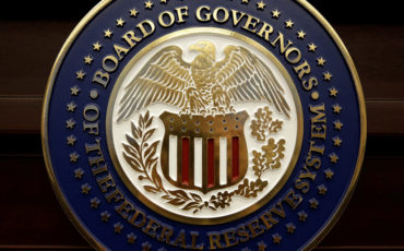 FILE PHOTO: The seal for the Board of Governors of the Federal Reserve System is displayed in Washington FILE PHOTO: The seal for the Board of Governors of the Federal Reserve System is displayed in Washington, U.S., June 14, 2017. REUTERS/Joshua Roberts/File Photo - RC15B156FD20