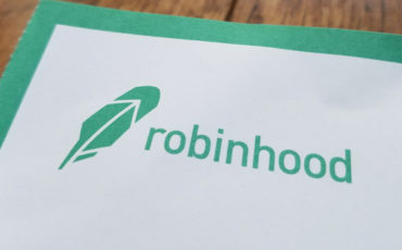Robinhood Close-up of logo for investment management app Robinhood on paper, against a light wooden surface, April 21, 2019. (Photo by Smith Collection/Gado/Getty Images)