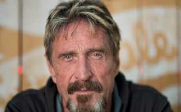 john-mcafee Antivirus pioneer John McAfee poses for a photograph in Montreal, Friday, August 24, 2013.(AP Photo/The Canadian Press, Graham Hughes)